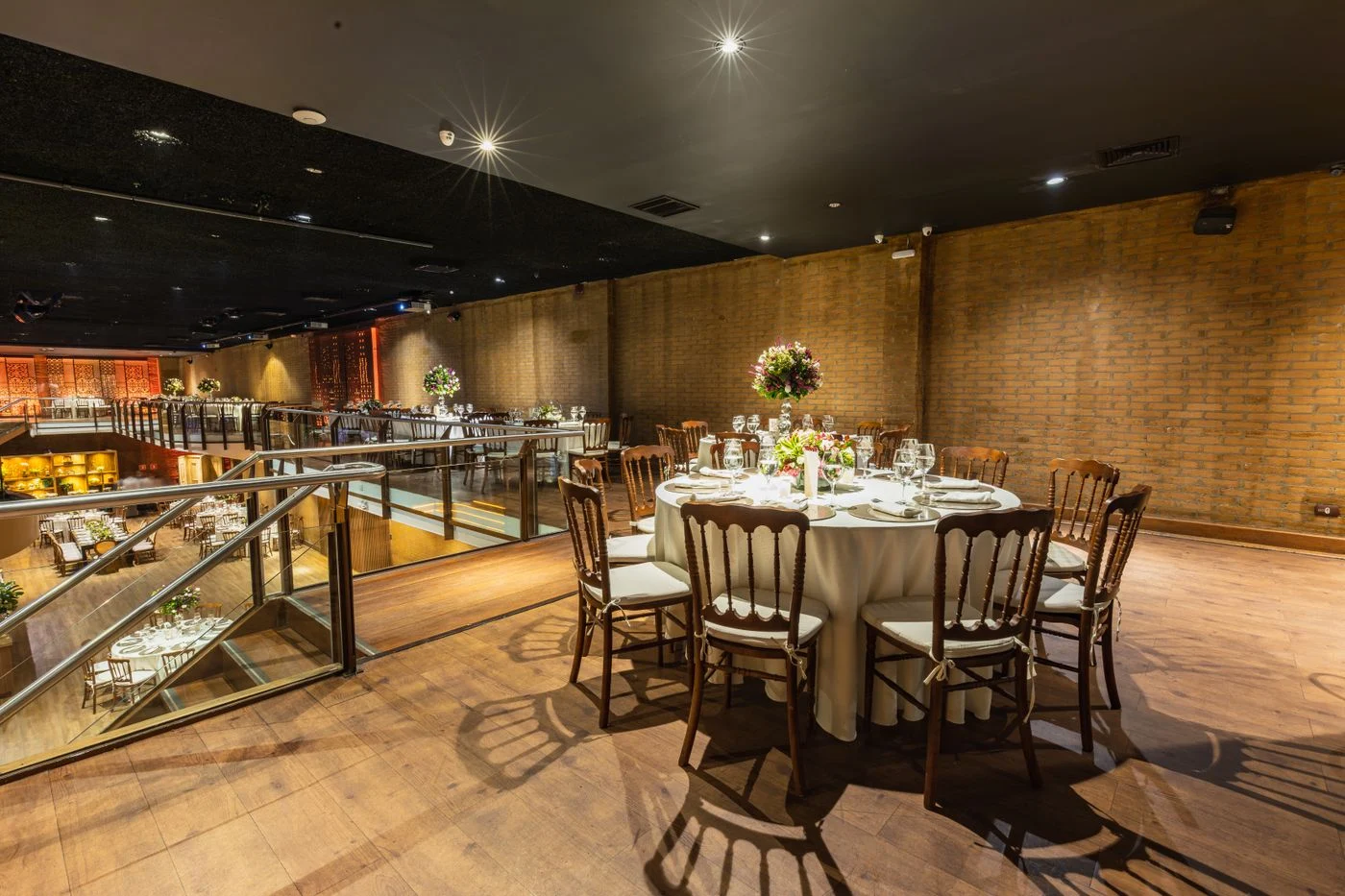 Formal banquet hall with dining tables prepared for an event