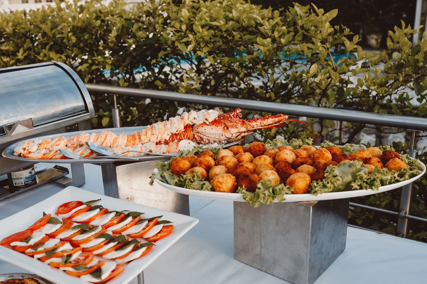 A spread of gourmet dishes and appetizers on a buffet table
